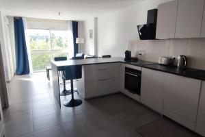 Appartements Duplex Neuf et Cosy avec Place Parking : photos des chambres