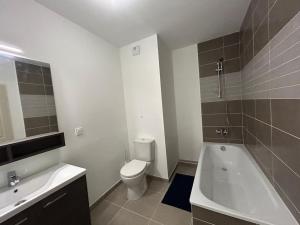 Appartements Duplex Neuf et Cosy avec Place Parking : photos des chambres