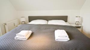 LIGHTHOUSE HOMES - moderne Ferienwohnungen mit Terrasse am Kirchenplatz