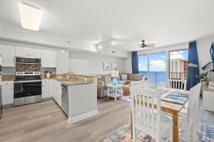 Modern Beachfront Condo on the Beach Sleeps 6! by Dolce Vita Getaways PCB