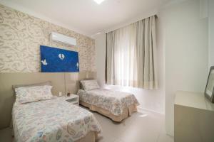 A17 - APARTAMENTO ALUGUEL DE TEMPORADA 03 SUÍTES PRÓXIMO AO MAR NO CENTRO DE BOMBINHAS