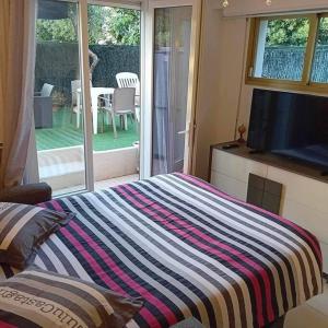 Studio cosy terrasse front mer