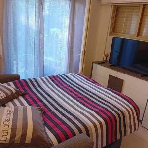 Studio cosy terrasse front mer