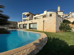 Stone Villa Saronida - 4hvězdičkové hotely ve městě Saronida