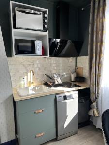 Appartements Appartement tout confort : photos des chambres