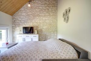 Appartements Les logements dans longere de la Gentiniere : photos des chambres
