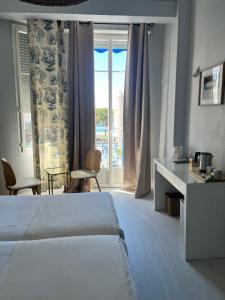 Hotels Hotel Eden - La Baigneuse : photos des chambres