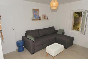 Appartements Studio independant avec jardin : photos des chambres