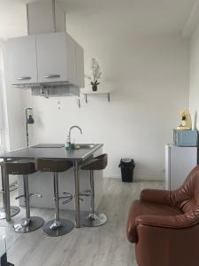 Appartements Calaisfornia1 : photos des chambres