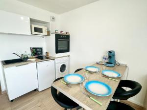 Appartements L'Opale - Vue mer : photos des chambres