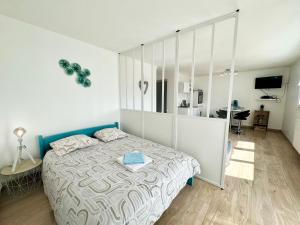 Appartements L'Opale - Vue mer : photos des chambres