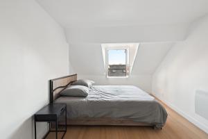 Appartements Duplex - 3 chambres - Coeur d-Arpajon : photos des chambres