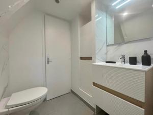 Appartements Le Clos de Colombiers hyper centre parking prive, proche sites du Debarquement : photos des chambres