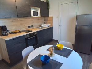 Appartements Le bon plan entre Caen et la mer ** Draps et menage inclus !** : photos des chambres