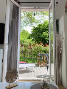 Maisons de vacances The Little Oak - tiny house with bed on mezzanine & terrace - from 1 to 4 p Disney, Paris & CDG : photos des chambres
