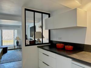 Appartements Le Petit Prieure : photos des chambres