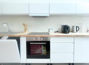 Appartements Place Sainte Marguerite : photos des chambres
