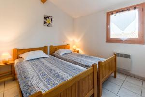 Appart'hotels Lagrange Vacances Les Maisonnettes : photos des chambres