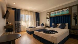 Triple Room room in Farina Hotel By Cigno