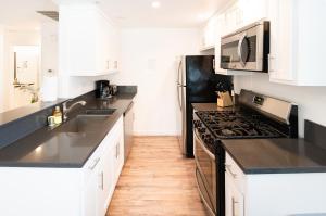 Sleek 1-Bedroom Apartment with AC & gated Parking space