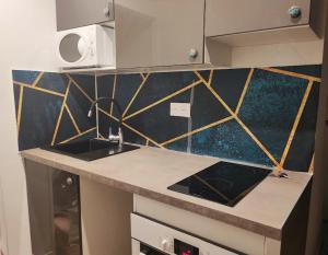Appartements La Perle Bleue, 100 m de la plage, parking, wifi : photos des chambres