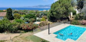 Corsicadream Arone superbe appartement dans villa, vue panoramique mer, piscine, proche Porticcio