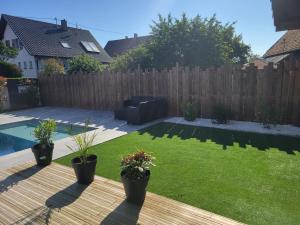 Maisons de vacances Logement prive dans Villa avec piscine : photos des chambres