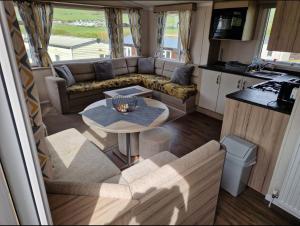 Experience Coastal Bliss in Our Modern 2019 Sea Viev 2 Bedroom static caravan at Clarach Bay Holiday Village!