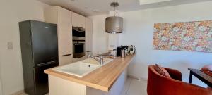 Appartements Appartement central, vue mer : photos des chambres