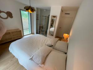 Appartements Superbe appart neuf centre ville 6 personnes calme avec jardin : photos des chambres