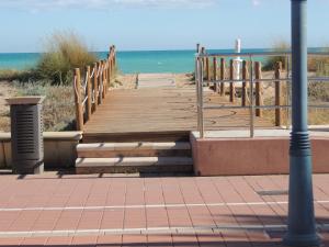 Frente a playa de arena