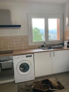 Appartements grand f2 climatise avec wifi plein centre BORGO : photos des chambres