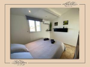 Appartements Charmant duplex avec tropezienne : photos des chambres