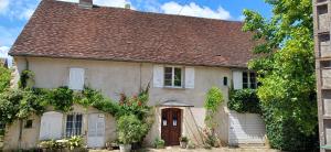 Appartements Studio dans belle maison ancienne et jardin ferme : photos des chambres