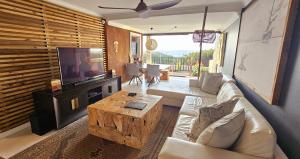 4 Dolphin Views La Mercy Luxury Beachfront Apartment with Private Swimming Pool