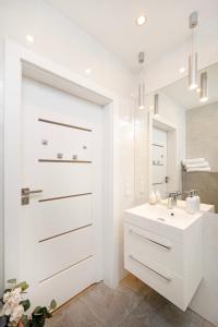 Manufaktura Residence - Apartament z Parkingiem i Dwoma Łazienkami