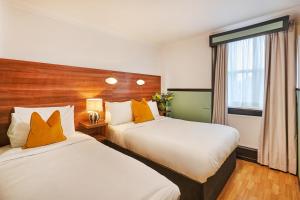 Triple Room room in OYO Flagship Huttons