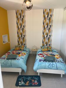 Appartements Chez Marjo & Flo : photos des chambres