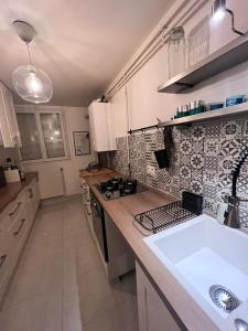 Appartements Charmant Appartement : photos des chambres