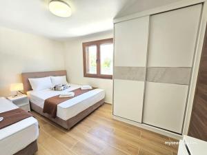 Summertime Villa just 90meters from the sea!