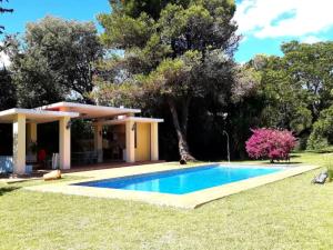 Casa 1 dormitorio con piscina privada y jardin