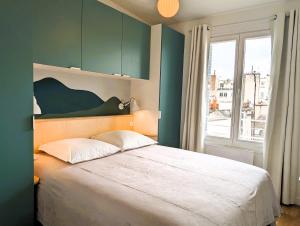 Appart sur les toits de Paris - Marais