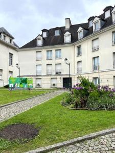 WonderSuite appartement - centre ville avec parking couvert -15mn de Paris et 10 mn de Stade de France, wifi, Netflix