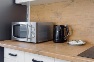 Coast Breeze Stylish Apartment by Noclegi Renters