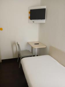 Hotels Unisotel Valenciennes EX-hotel F1 : photos des chambres