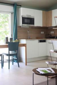 Maisons de vacances 7enGarrigue - Charmant deux pieces avec piscine : photos des chambres