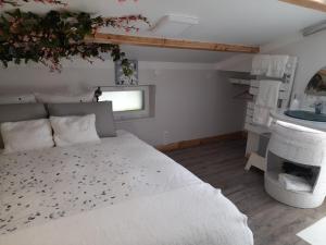 B&B / Chambres d'hotes La maison du Bonheur, borne de recharge VE : photos des chambres
