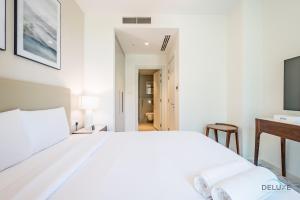Seafront 4BR Apartment with Assistant Room in The Address Fujairah Residences Block B, Fujairah by Deluxe Holiday Homes
