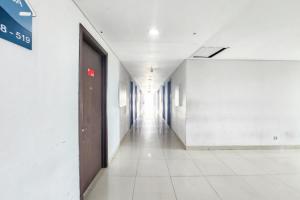 RedLiving Apartemen Enviro Cikarang - Stars Rooms