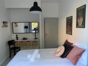 Appartements Le Jules Appart'Hotel, centre ville Romans-sur-Isere : photos des chambres